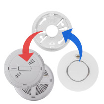 Part of the deta1111 1115 twist replacement smoke alarm shown in a simple replacement diagram with arrows indicating assembly steps