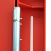Close up of a metal hinge on a red tempus temporary fire door
