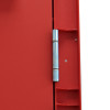 Close-up of metal hinges on a tempus temporary fire door showing part of the red door panel