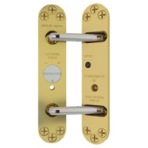 Front view of perko powermatic brass unit showing two connected metal plates with adjustment dials and screws