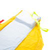 Top closeup of a spectrum healthcare resqmat showing white and yellow fabric with yellow carrying straps