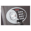 Close up of the phoenix vela 0801 electronic lock keypad with key inserted and lock dial on a textured surface