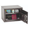 phoenix vela 0802 electronic lock showing door open with items stored inside including a passport, camera and watch