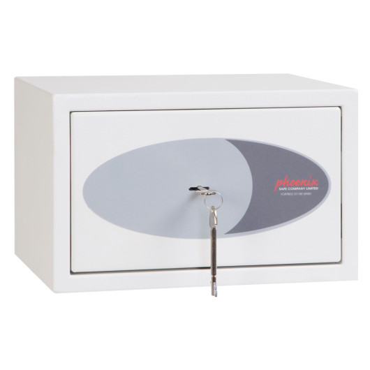 front view of phoenix fortress 1181 key lock showing white rectangular box with key in lock
