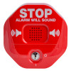 Front view of a red sti exit stopper showing the word STOP and speaker symbols
