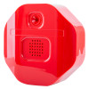 Angled view of a red exit stopper remote sounder with speaker holes and a circular component above it