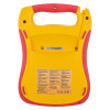 Back of defibtech lifeline aed trainer unit showing yellow casing with red handle and safety instructions label