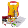 defibtech lifeline aed trainer unit with remote control, battery, pads, charger, and instruction manual laid out