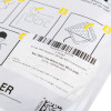 Close-up of the Stjdefidpp Defisign Life Paediatric Defibrillator Pads Label showing expiry date and instructions
