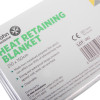 Close-up of packaging for disposable heat retaining adult blanket showing text and product information on white background
