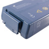 philips heartstart showing a close-up of a blue rectangular device with a small open lid on one end