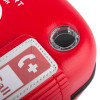 Closeup detail of the red Philips Heartstart FRx defibrillator carry case showing part of the label and a clear circular component