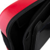 Closeup inside the Philips HeartStart FRx defibrillator carry case showing red exterior and internal compartments