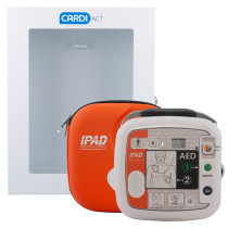 A portable orange IPAD‑branded automated external defibrillator (AED) and matching carry case positioned in front of a white wall‑mounted CARDIACT cabinet, with the AED showing clear pad‑placement diagrams and labelled ON/OFF and Shock buttons.