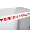 Closeup text on zoll aed plus wall mount cabinet alarm showing emergency defibrillator in red letters with heart symbol