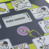 Closeup detail of the zoll aed plus trainer 2 showing screen with push harder message and instructional icons