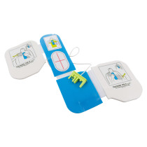 angled view of zoll aed plus training cpr d padz set showing pads and instructional diagrams
