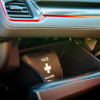 st john bs85992 motoring kit medium shown inside a car glove compartment with red trim visible above