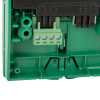 Closeup of the back of an access control emergency manual call point showing wiring connections and internal components