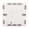 Back of the access control white exit button showing mounting holes and wiring spaces