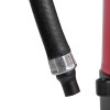 Close-up of the nozzle on a thomas glover 9kg monnex powder extinguisher showing black hose and silver fitting