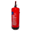 Side view of a red thomas glover 9kg monnex powder extinguisher showing the label and metal top mechanisms