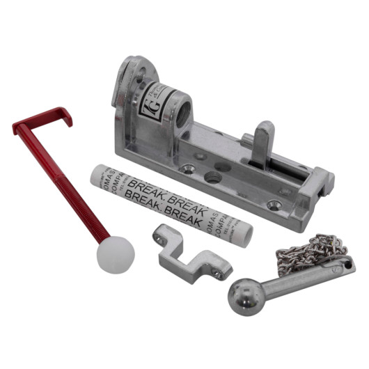 Parts and components shown as contents of the thomas glover panic bolt mk2 including metal bolt and red plastic tool