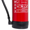 bottom section of a powerx 6kg powder extinguisher showing the base hose connection and label details
