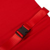 Close up of a black plastic buckle on a red strap of the thorpe mill emergency evacuation sledge