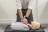 A young man performing CPR on a training Manaquin