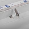 Close-up of a screw attached to the mailsafe mailguard protection bag showing metal and plastic parts