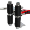 Close-up of the rubberised grip on the ultrafire extinguisher servicing clamp showing black padded handles and metal fittings