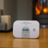 ultrafire ubco1d carbon monoxide alarm with display showing zero peak reading on a wooden table