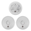Group of three white battery smoke alarms and heat alarm home essentials kit items on a white background