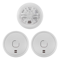 Group of three white battery smoke alarms and heat alarm home essentials kit items on a white background