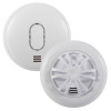 Two round white Ultrafire alarms, one smoke alarm with a smooth front and oval LED indicator, and one heat alarm featuring a vented radial heat‑sensing grid. Both units have small grille openings for sound output.