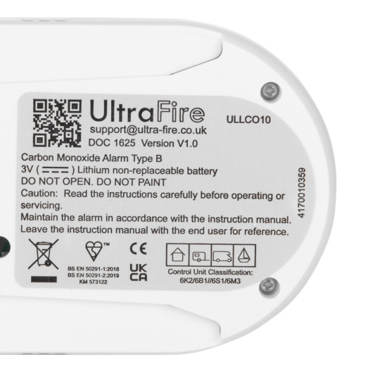 Back of a sealed 10 year carbon monoxide detector showing label and safety information with clear text and icons