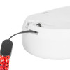 Side angle view of sealed 10 year carbon monoxide detector showing a red strap attached to its side