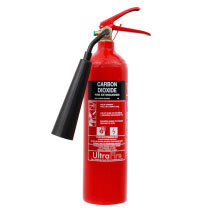 A red CO2 fire extinguisher with a black label
