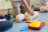 A demonstration of a training defibrillator