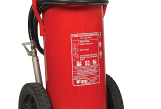 Close-up image of a red wheeled fire extinguisher showing the label and hose on the frame