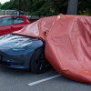 bridgehill single use car fire blanket partially covering a car bonnet in a parking space