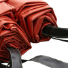 Close up of rolls of the bridgehill single use car fire blanket showing the red fabric and black handles