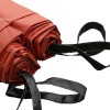 Close up of a partially deployed Bridgehill single use car fire blanket showing fabric and black handles