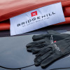 bridgehill single use car fire blanket folded with protective gloves resting beside it on a dark surface