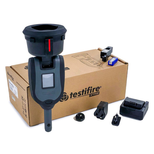 Contents of the testifire xtr2 all in one smoke heat detector tester kit displayed next to its branded cardboard box