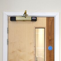 The acoustically activated door closer is also available in polished brass