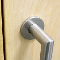 Snap fit conceals screw fixings when installed