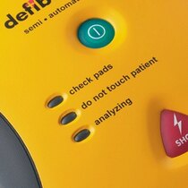 Defibtech Lifeline AED equiped with two bright operation buttons