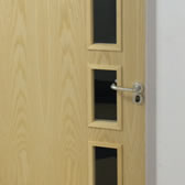 Glazed fire door with an Ash veneer